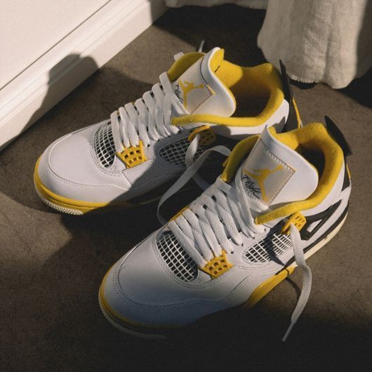 Кросівки Jordan 4 Retro Vivid Sulfur (W) AQ9129-101 фото